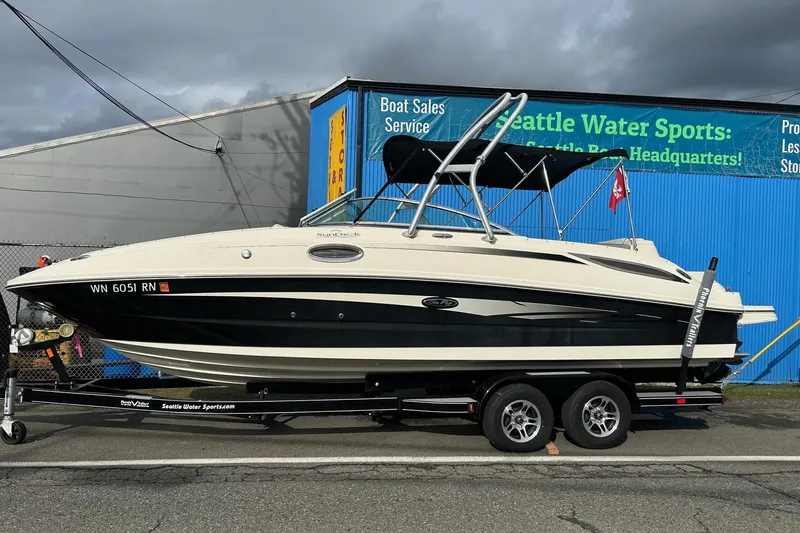 The Image of 2010 Sea Ray 260 Sundeck boat on trailer at Seattle Water Sports dealership. - 0