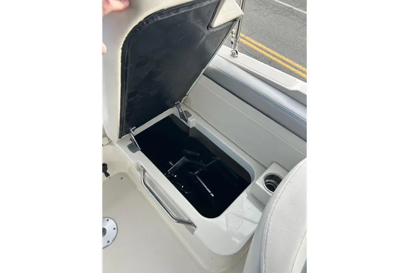 Slide: The Image of Open storage compartment on 2010 Sea Ray 260 Sundeck boat. - 22