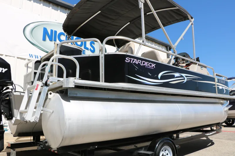 Slide: The Image of 2012 Starcraft Stardeck 206 4-PT pontoon boat with canopy on trailer. - 14