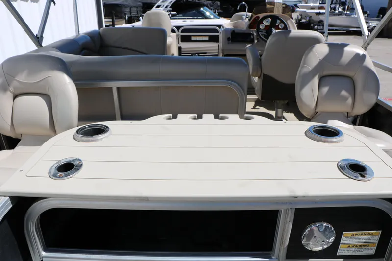 Slide: The Image of 2012 Starcraft Stardeck 206 4-PT boat interior with seating and table. - 21