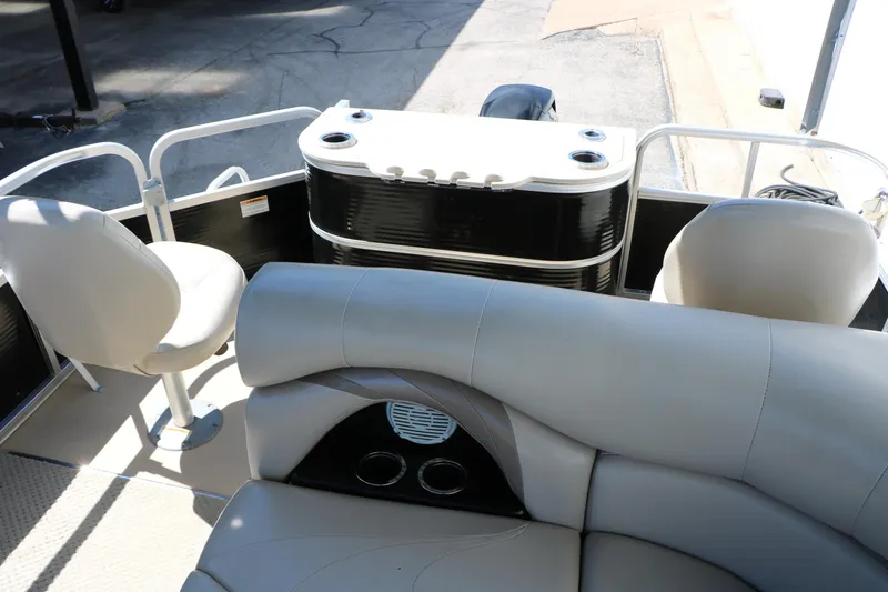 Slide: The Image of 2012 Starcraft Stardeck 206 4-PT boat interior with seating and console. - 24