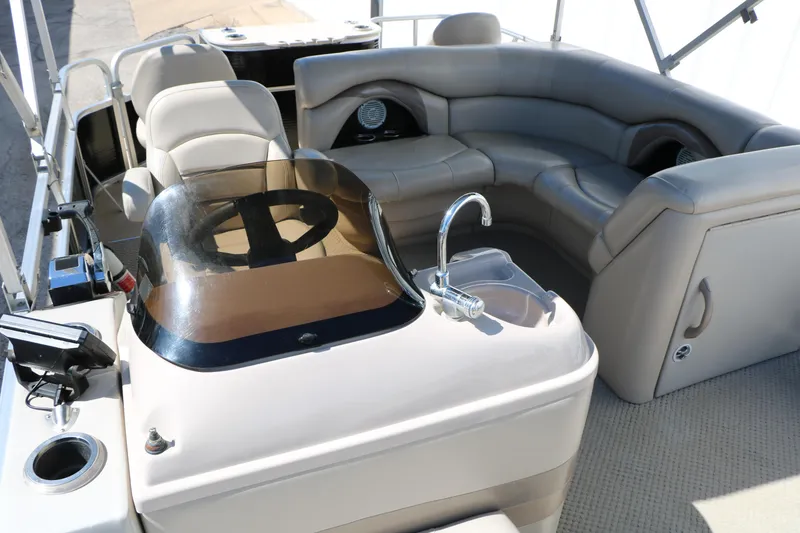 Slide: The Image of 2012 Starcraft Stardeck 206 4-PT boat interior with seating and steering console. - 32