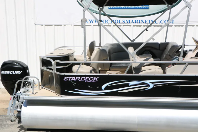 Slide: The Image of 2012 Starcraft Stardeck 206 4-PT pontoon boat with Mercury engine, side view. - 7
