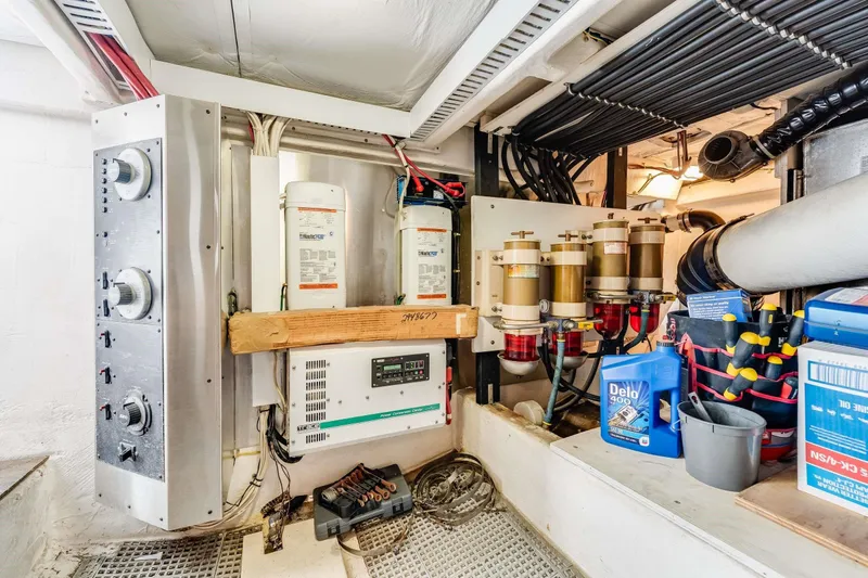 Slide: The Image of Engine room of 1998 Bayliner 5788 Pilot House Motoryacht with equipment and tools. - 120