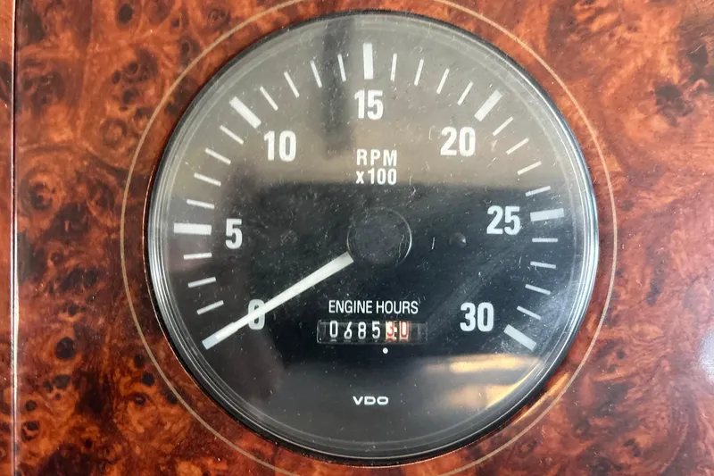 Slide: The Image of Tachometer of 1998 Bayliner 5788 Pilot House Motoryacht showing RPM and engine hours. - 37