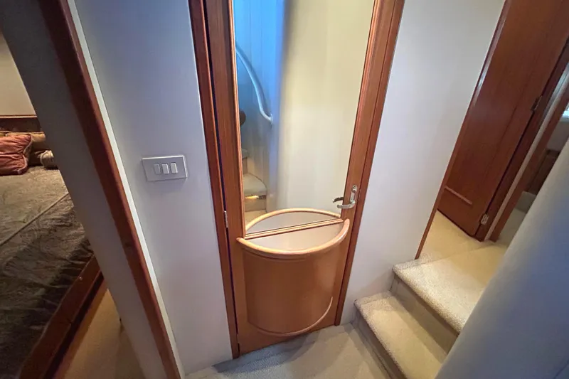 Slide: The Image of Laundry area in 1998 Bayliner 5788 Pilot House Motoryacht with stacked washer and dryer. - 41