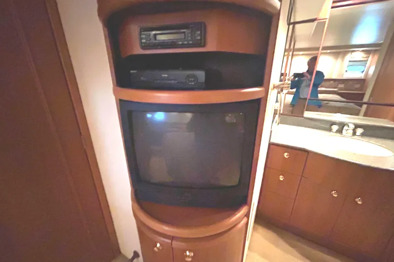 Slide: The Image of Bathroom interior of 1998 Bayliner 5788 Pilot House Motoryacht with toilet and shower. - 50