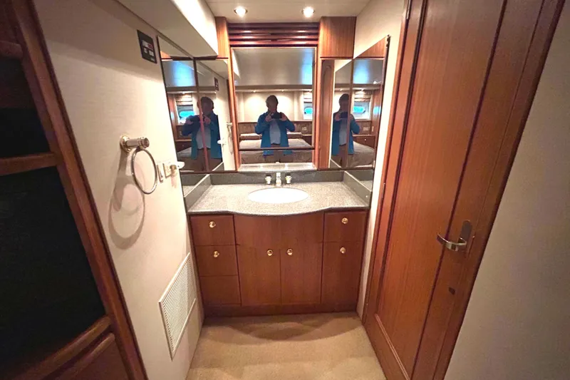 Slide: The Image of Bathroom interior of 1998 Bayliner 5788 Pilot House Motoryacht with shower and window. - 52