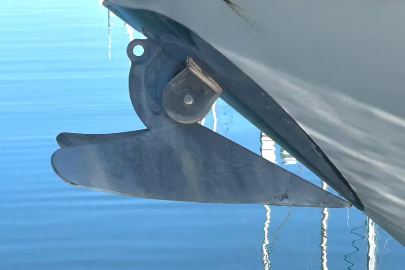 Slide: The Image of Engine room of 1998 Bayliner 5788 Pilot House Motoryacht, showcasing detailed port machinery components. - 71