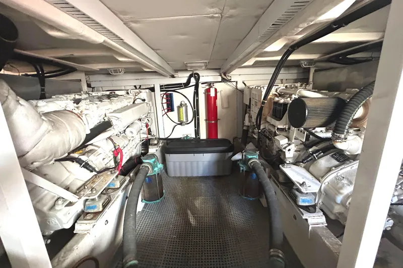 Slide: The Image of 1998 Bayliner 5788 Pilot House Motoryacht propellers wrapped for protection. - 73