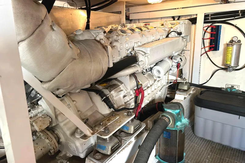 Slide: The Image of Engine room of 1998 Bayliner 5788 Pilot House Motoryacht with fuel filters and equipment. - 74