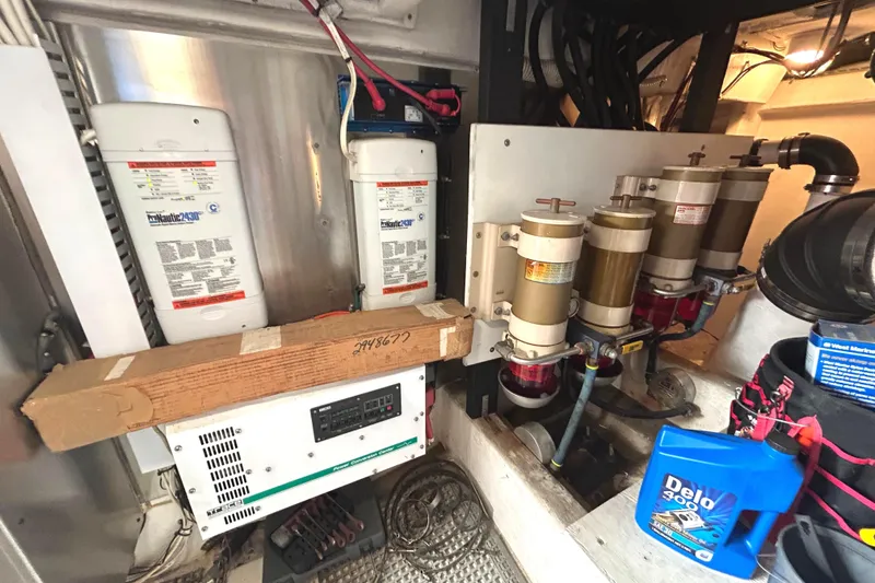 Slide: The Image of Fuel filters in a 1998 Bayliner 5788 Pilot House Motoryacht engine room. - 77