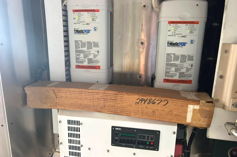 Slide: The Image of Engine room of 1998 Bayliner 5788 Pilot House Motoryacht with maintenance supplies and propeller. - 78