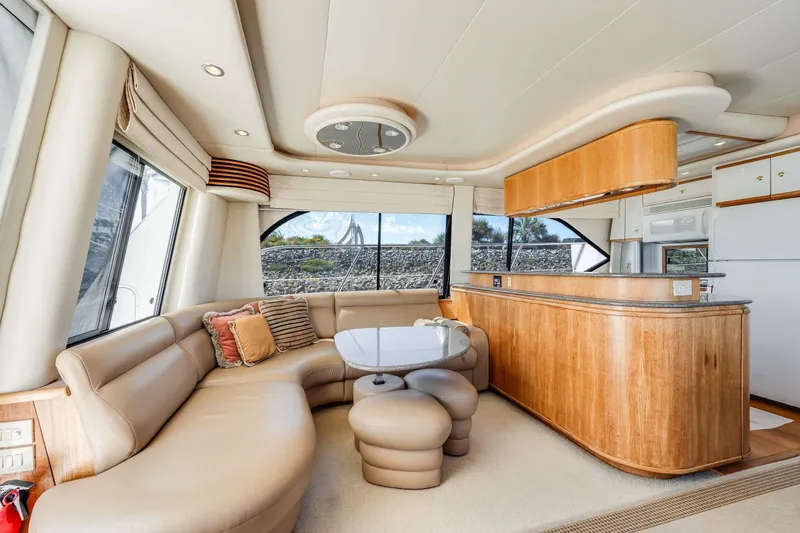 Slide: The Image of Luxurious interior of 1998 Bayliner 5788 Pilot House Motoryacht with elegant seating and modern design. - 88