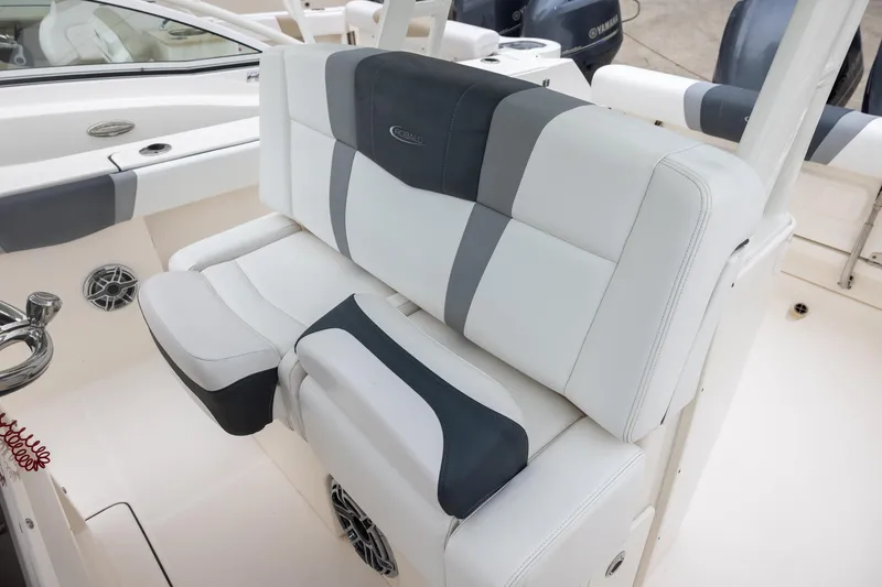 Slide: The Image of 2021 Robalo R272 Center Console boat with stylish seating and modern design. - 12