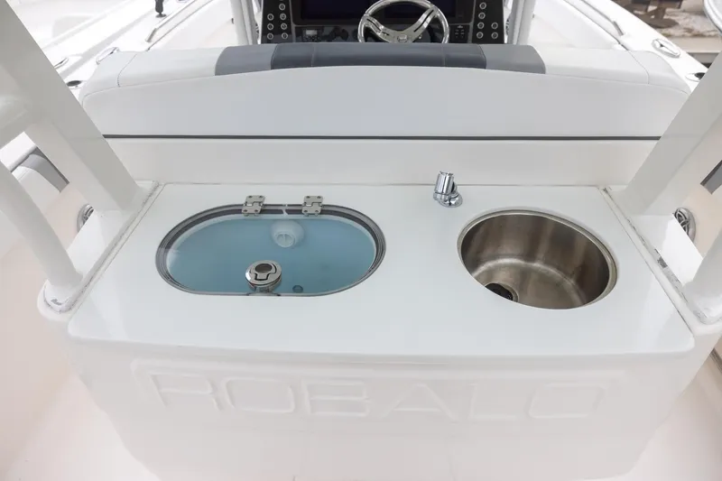 Slide: The Image of 2021 Robalo R272 Center Console boat with livewell and sink station. - 6