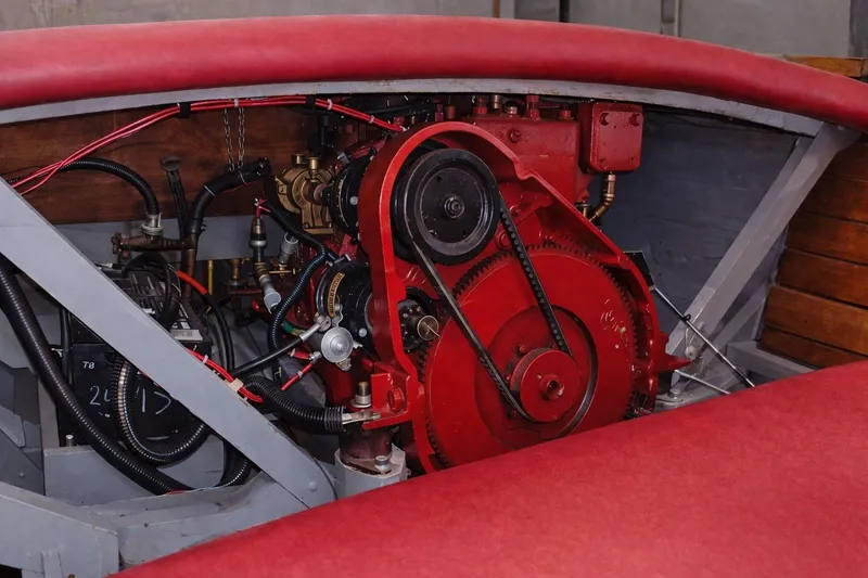 Slide: The Image of 1931 Dodge 16' Sea Nymph engine, red components, vintage mechanical design. - 15