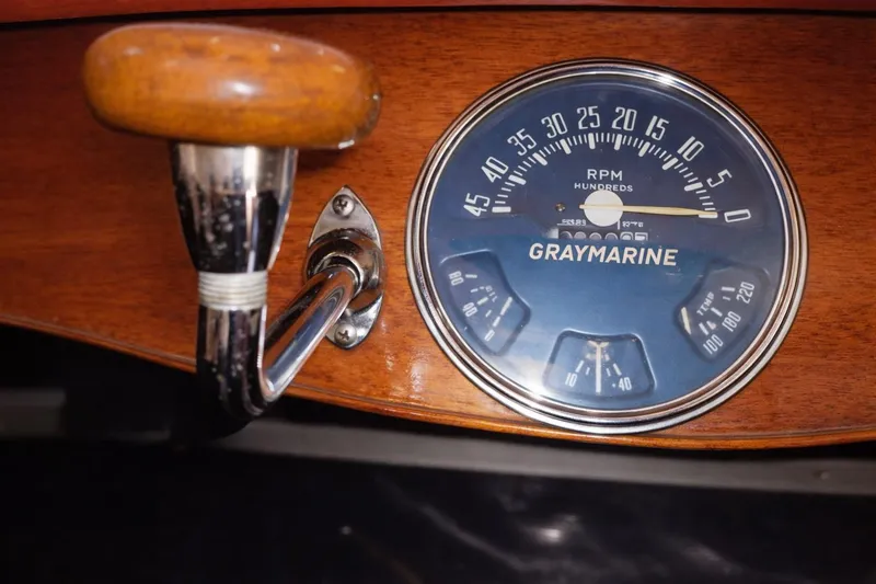 Slide: The Image of 1931 Dodge Sea Nymph dashboard with Graymarine RPM gauge and wooden handle. - 8