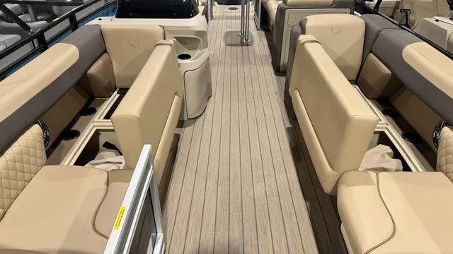 Slide: The Image of Interior of 2026 Godfrey Pontoons Sweetwater 2286 SB with beige seating. - 17
