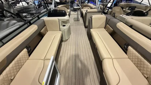 Slide: The Image of Interior of 2026 Godfrey Pontoons Sweetwater 2286 SB with beige seating. - 18