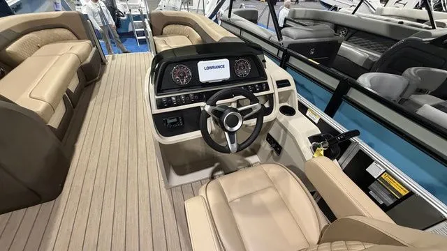 Slide: The Image of Interior of 2026 Godfrey Pontoons Sweetwater 2286 SB with steering wheel and seating. - 20