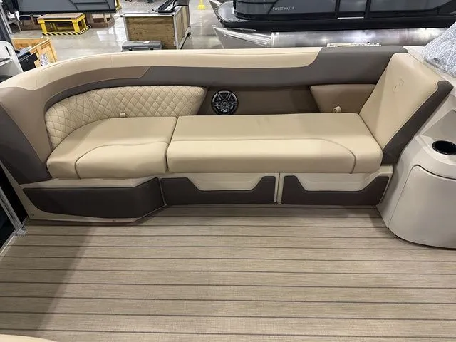 Slide: The Image of Interior of 2026 Godfrey Pontoons Sweetwater 2286 SB with beige seating area. - 4