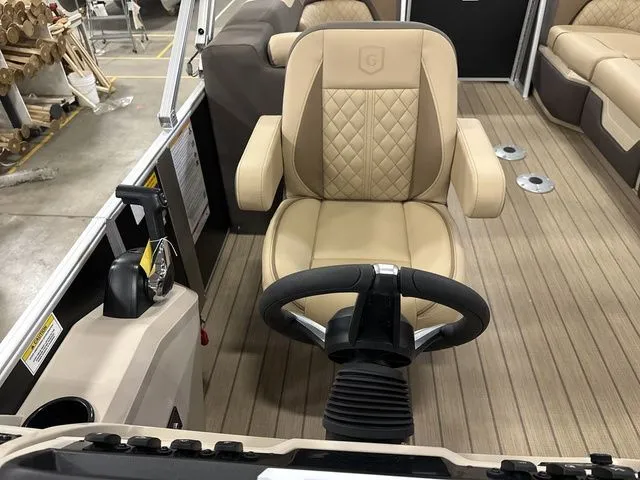 Slide: The Image of Interior of 2026 Godfrey Pontoons Sweetwater 2286 SB with luxurious helm seat. - 9
