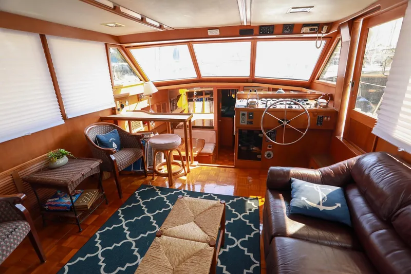 Slide: The Image of Luxurious interior of 1987 Lien Hwa 47 Elegant MK III yacht with helm and seating area. - 14