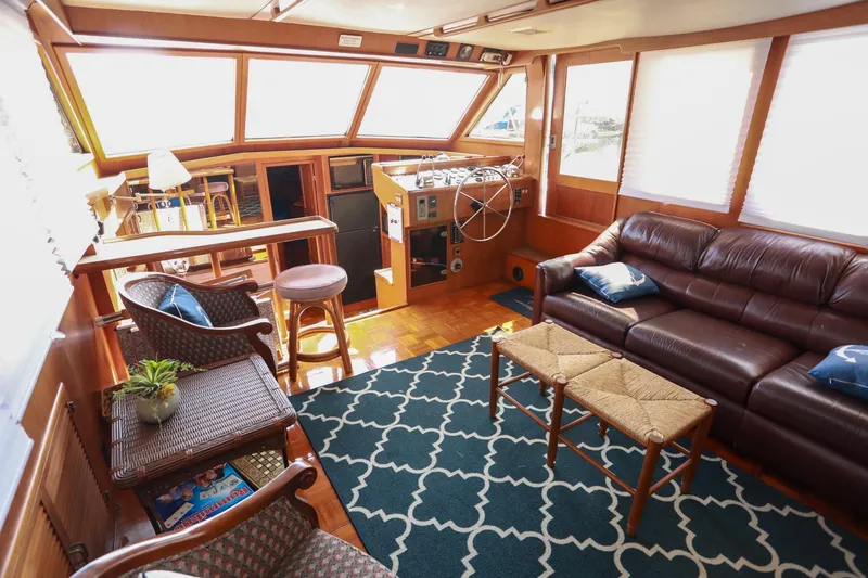 Slide: The Image of Luxurious interior of 1987 Lien Hwa 47 Elegant MK III yacht with plush seating and helm. - 17