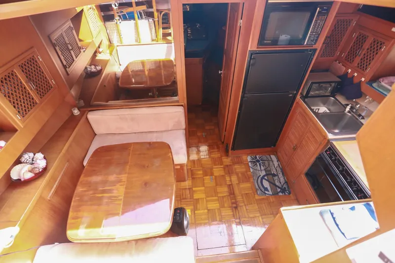 Slide: The Image of Interior of 1987 Lien Hwa 47 Elegant MK III yacht with kitchen and dining area. - 21