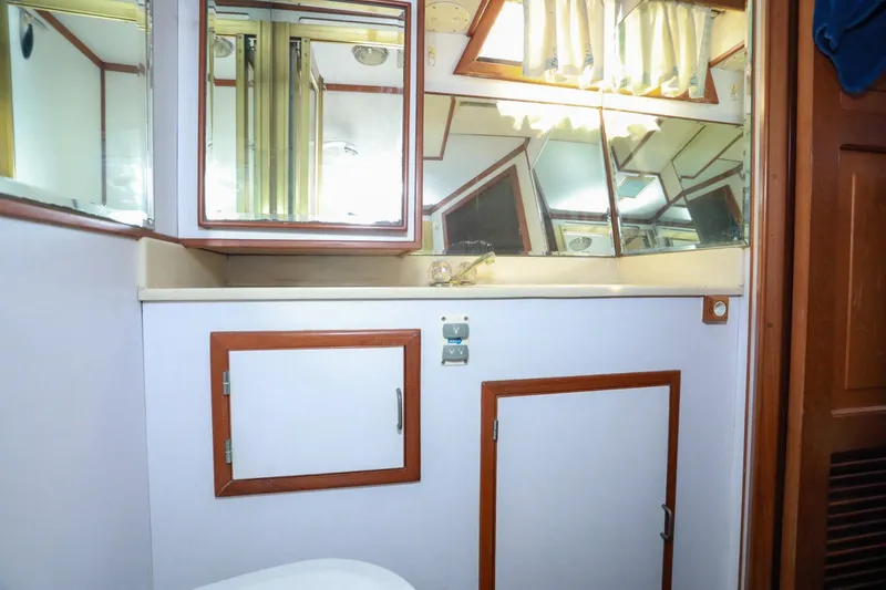 Slide: The Image of Bathroom interior of 1987 Lien Hwa 47 Elegant MK III yacht with mirrors and cabinets. - 29