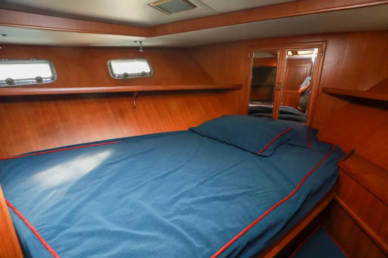 Slide: The Image of Cozy cabin interior of 1987 Lien Hwa 47 Elegant MK III yacht with blue bedding. - 31