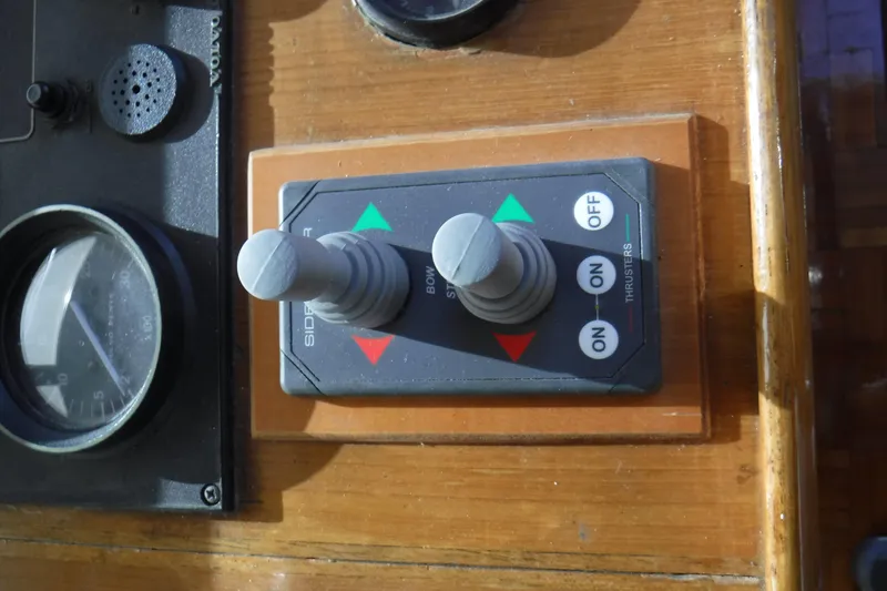 Slide: The Image of Control panel of 1987 Lien Hwa 47 Elegant MK III yacht with thruster switches. - 35