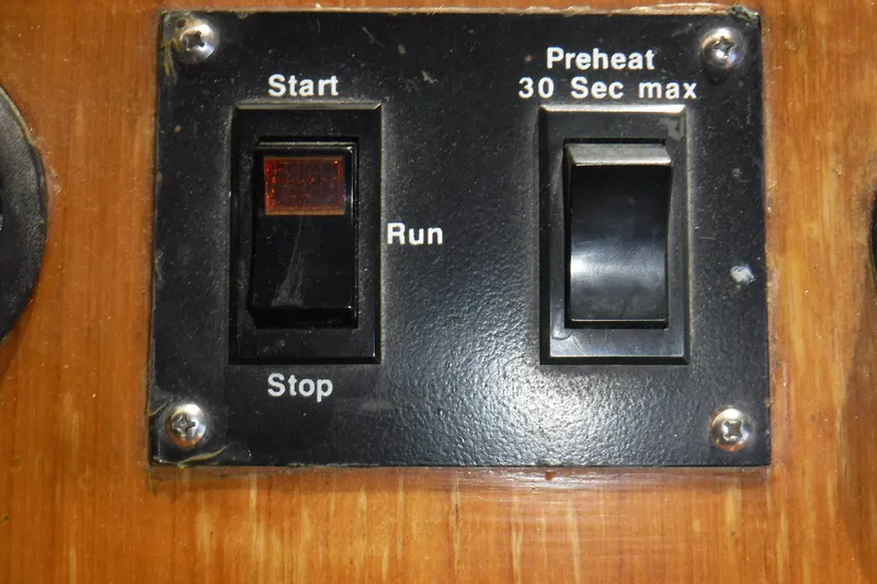 Slide: The Image of Control panel with start, stop, and preheat switches on a 1987 Lien Hwa 47 Elegant MK III. - 41