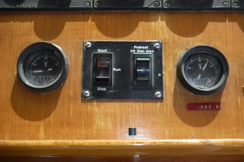 Slide: The Image of Control panel of a 1987 Lien Hwa 47 Elegant MK III yacht with gauges and switches. - 42