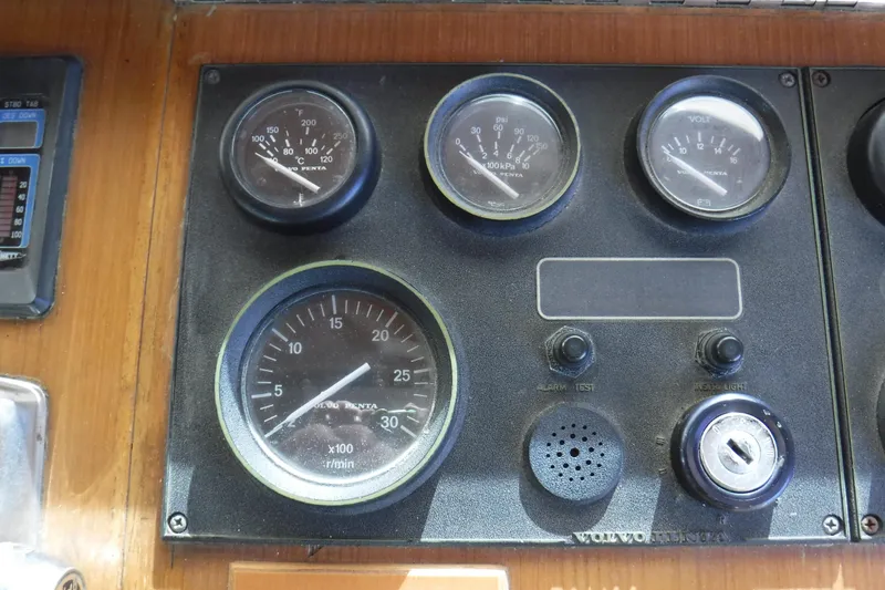 Slide: The Image of Control panel of a 1987 Lien Hwa 47 Elegant MK III yacht with gauges and switches. - 46