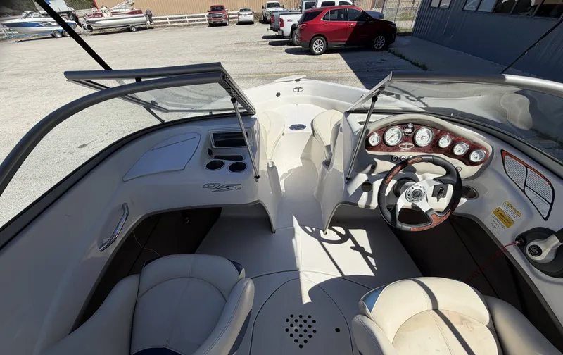 Slide: The Image of Interior of a 2013 TAHOE - WRMG Q5i boat with steering console. - 17