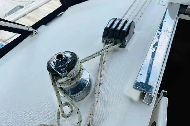 Slide: The Image of Close-up of a 1997 Hunter Passage 420 sailboat winch and rope system. - 11