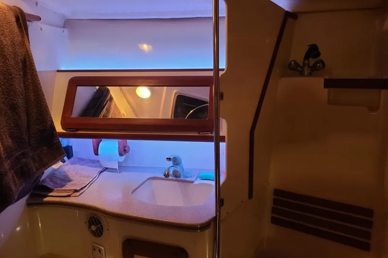 Slide: The Image of Bathroom interior of 1997 Hunter Passage 420 yacht with shower and sink. - 22