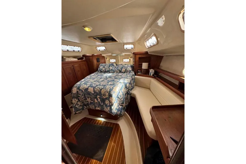 Slide: The Image of Interior of 1997 Hunter Passage 42 yacht bathroom with sink and mirror. - 25