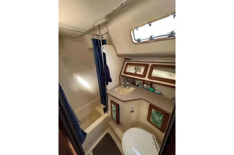 Slide: The Image of Floor plan of 1997 Hunter Passage 42 sailboat, showcasing interior layout and design. - 27