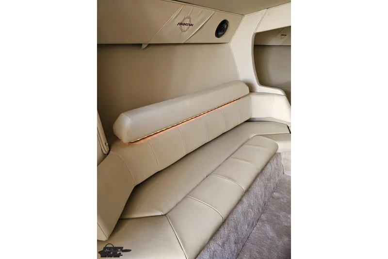 Slide: The Image of Luxurious interior of 2009 Fountain 47 Lightning boat with beige leather seating. - 100