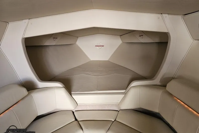 Slide: The Image of Interior cabin of 2009 Fountain 47 Lightning boat with beige upholstery. - 101