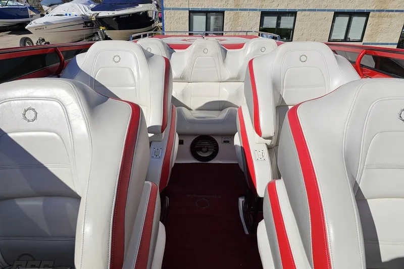 Slide: The Image of Interior of 2009 Fountain 47 Lightning boat with white and red seating. - 109