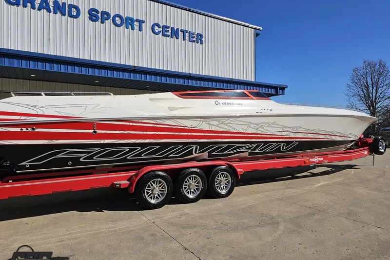 Slide: The Image of 2009 Fountain 47 Lightning boat on red trailer at Grand Sport Center. - 11
