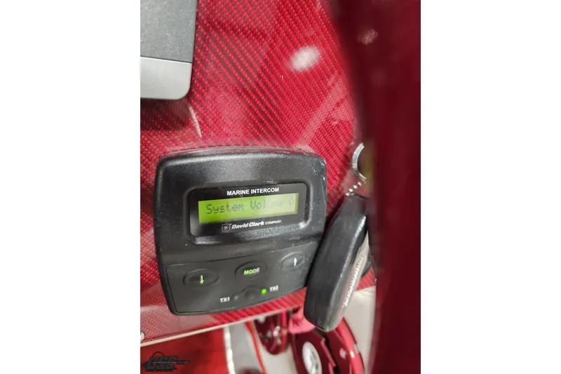 Slide: The Image of Marine intercom system in 2009 Fountain 47 Lightning boat with red carbon fiber background. - 119