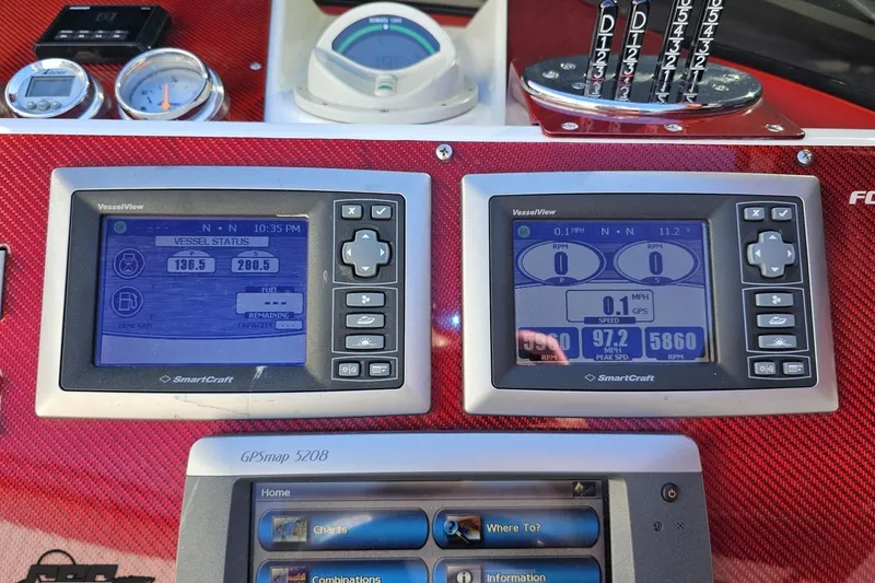 Slide: The Image of Dashboard of a 2009 Fountain 47 Lightning boat with SmartCraft VesselView displays. - 121