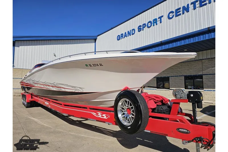 Slide: The Image of 2009 Fountain 47 Lightning boat on red trailer at Grand Sport Center. - 15
