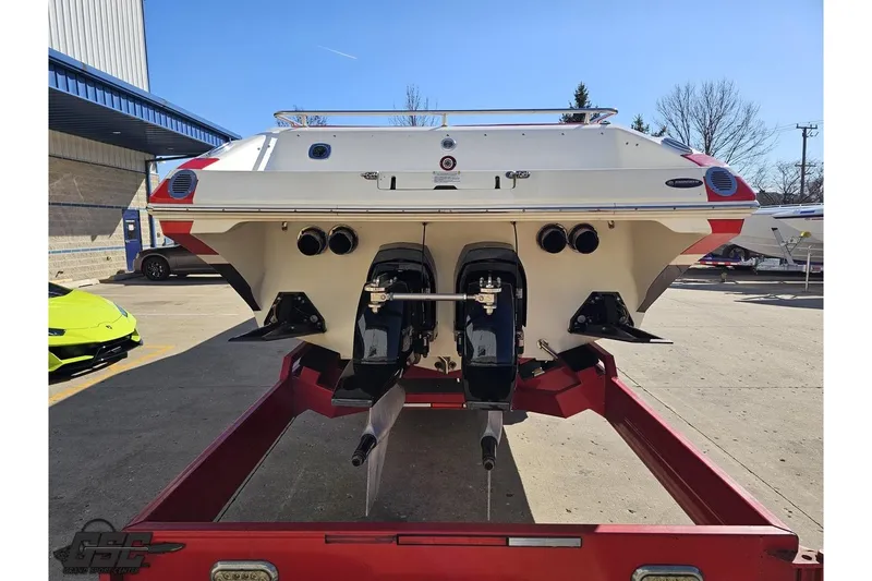 Slide: The Image of 2009 Fountain 47 Lightning boat on trailer, rear view in outdoor setting. - 29