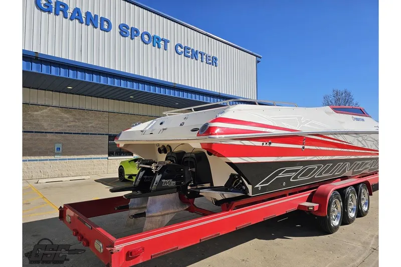 Slide: The Image of 2009 Fountain 47 Lightning boat on trailer at Grand Sport Center. - 33